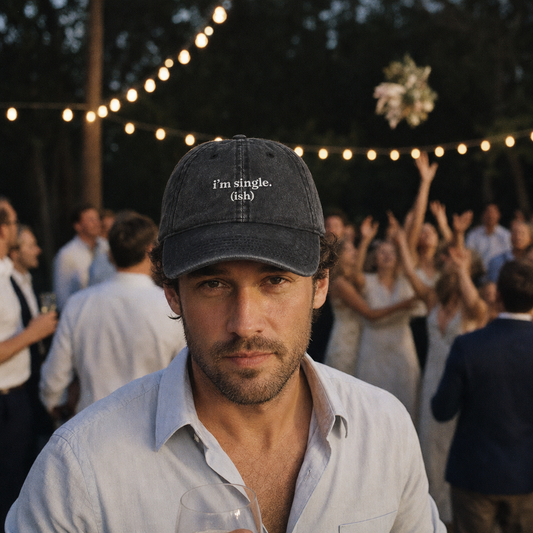I'm Single (ish) embroidered vintage cap in black, worn at a wedding reception