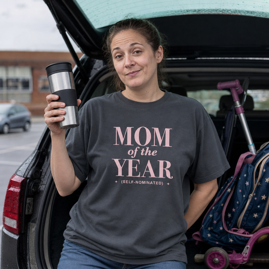 Mom of the Year oversized tee worn on the school run, travel mug raised like a trophy