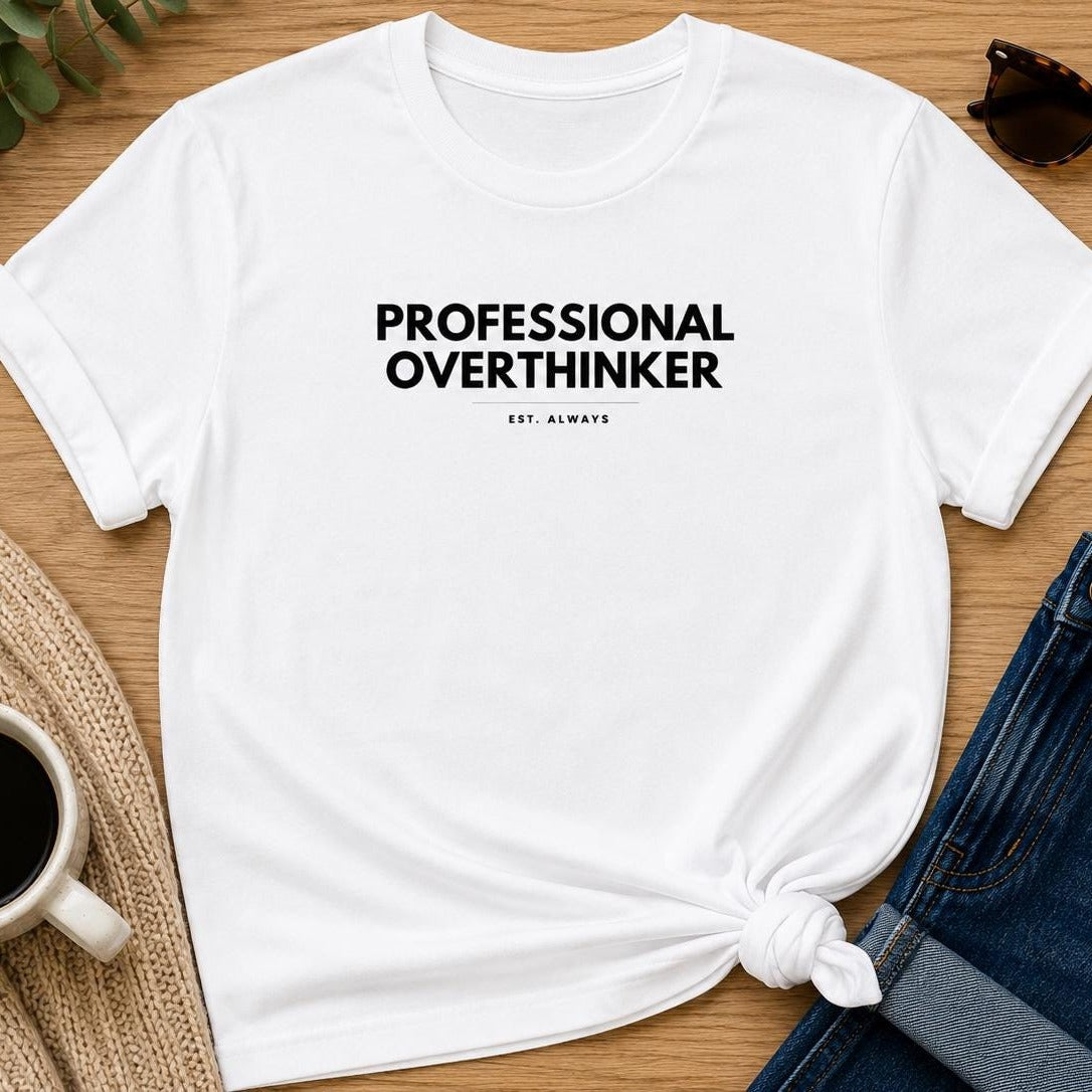 Professional Overthinker tee worn in a coffee shop
