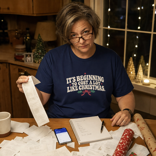 It's Beginning to Cost a Lot Like Christmas tee worn while going through Christmas receipts