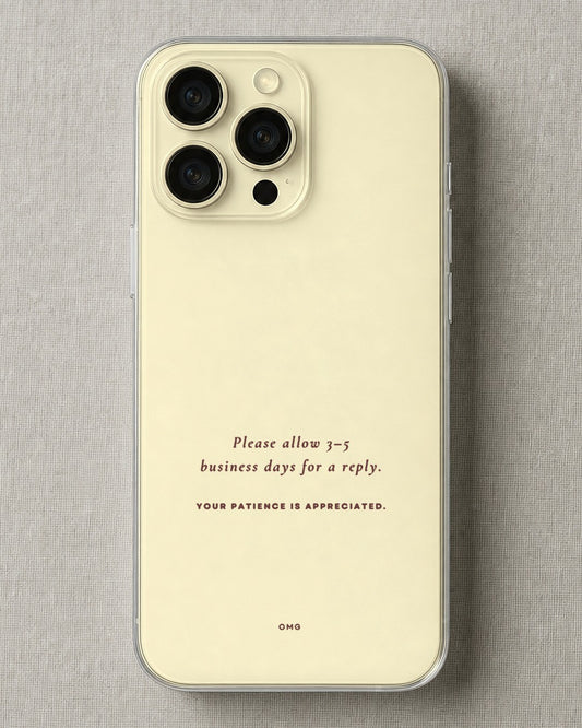 Clear iPhone case printed “Please allow 3-5 business days for a reply” in dark rose lettering